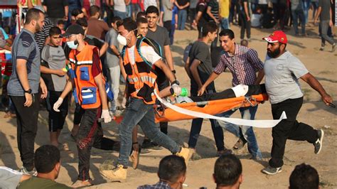 Gaza Health Ministry says over 200 Palestinians killed in hospital explosion it claims was caused by Israeli airstrike